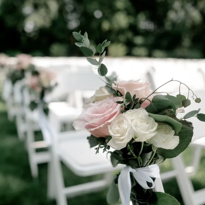 Poppy's pew markers floral arrangements for wedding 