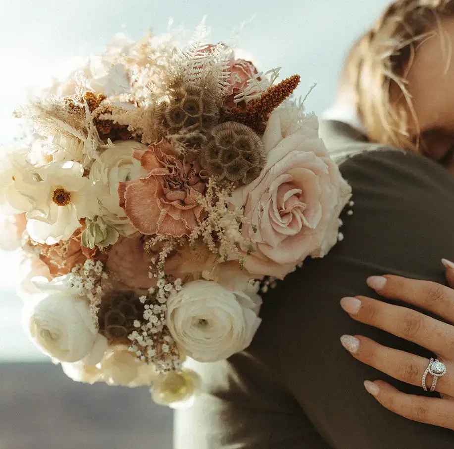 Floral bouquets at wedding reception
