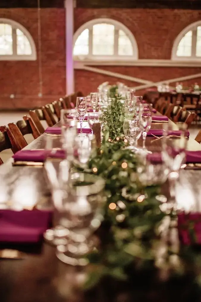 Wedding reception tables adorned with floral centerpieces