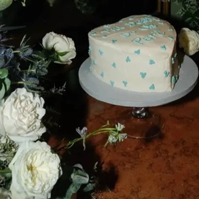 Summer wedding flower ideas incorporating blue thistles